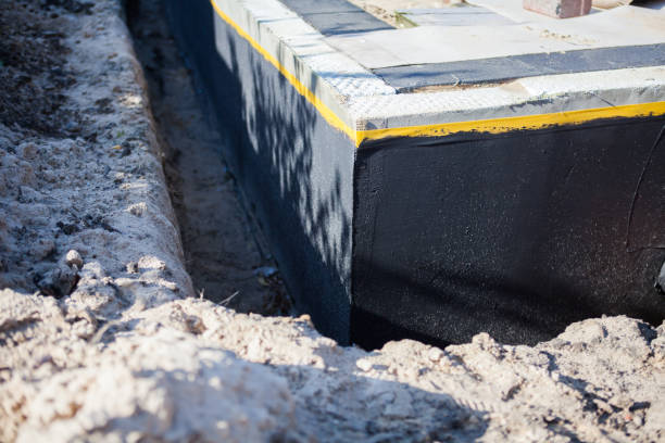 Professional Exterior Waterproofing technician working in Glencoe, MN